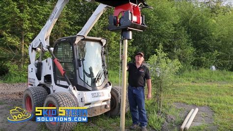 home made post driver for skid steer|skid steer vibratory post driver.